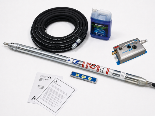Pipe piercing tool kit with hose, lubricant, control unit, and level for underground utility installation